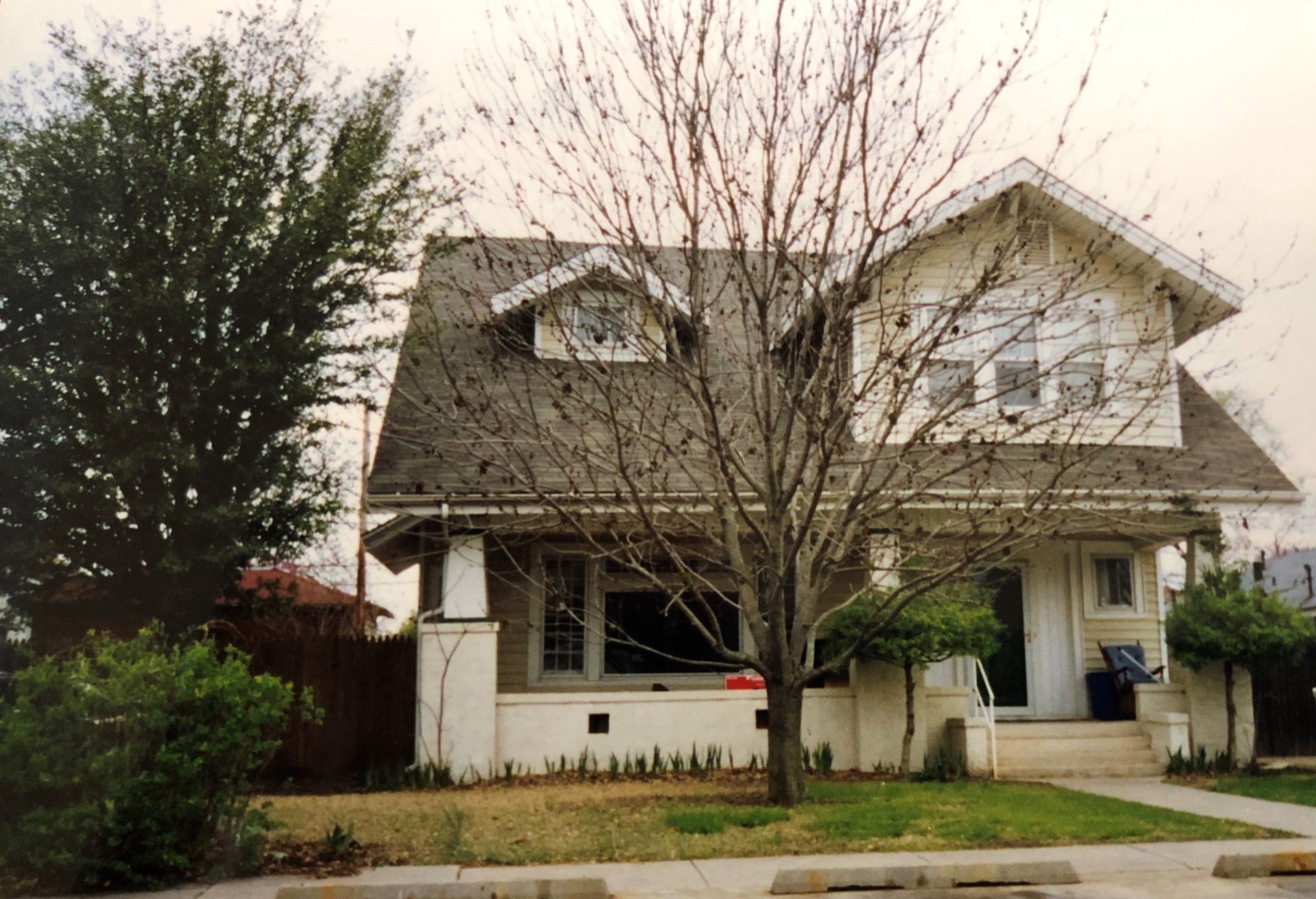 A two-story home in Norman, Oklahoma from the Women&rsquo;s Resource Center&rsquo;s early years.